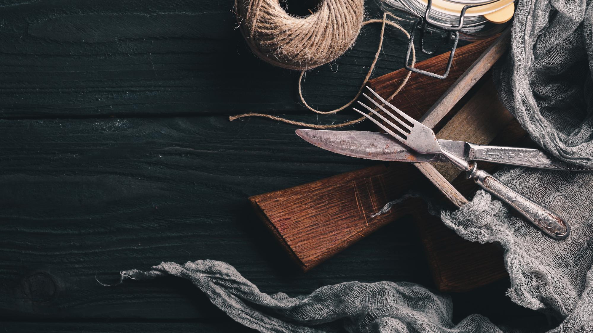 Workshop wooden table with threads and needles