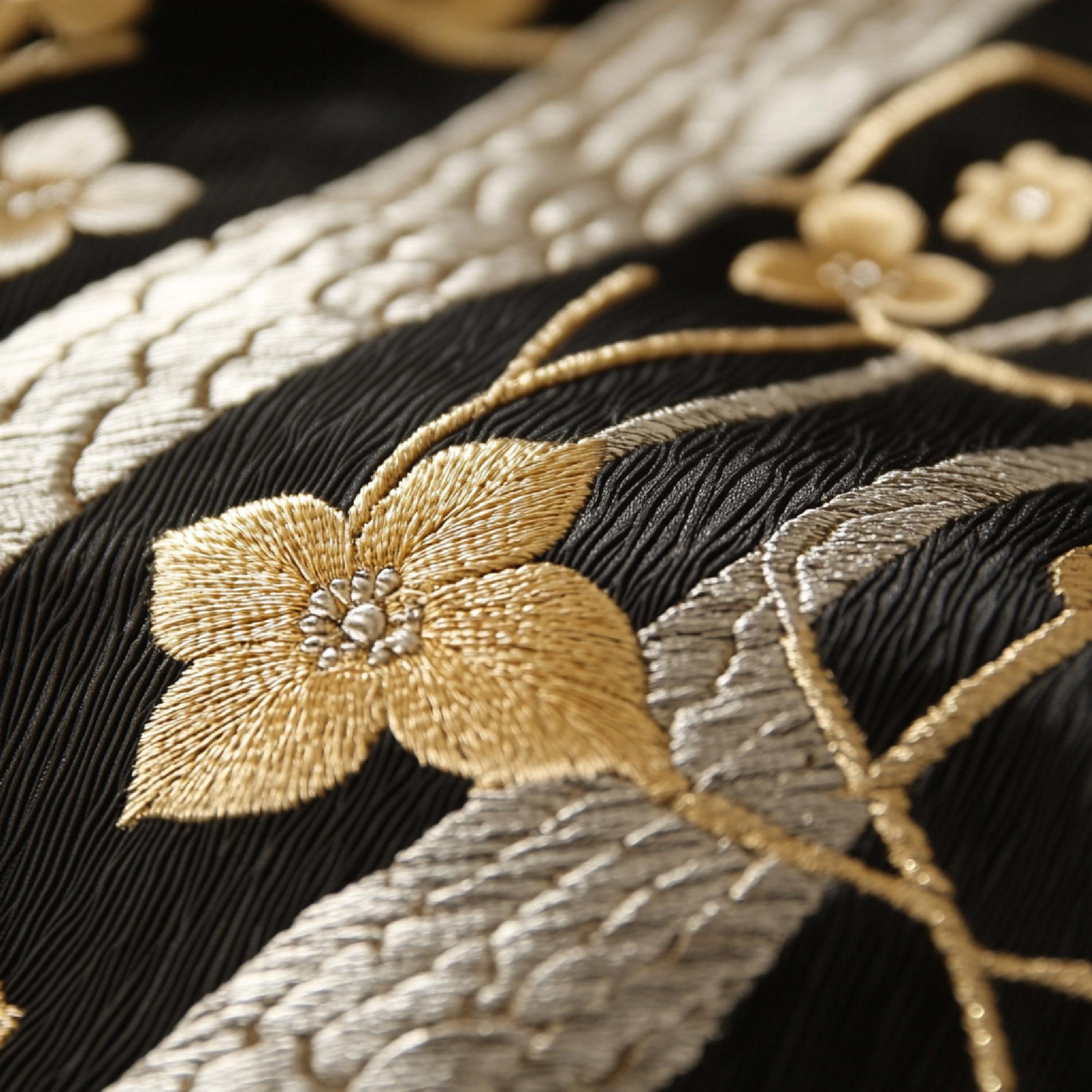 Close-up luxury embroidered floral motif on silk